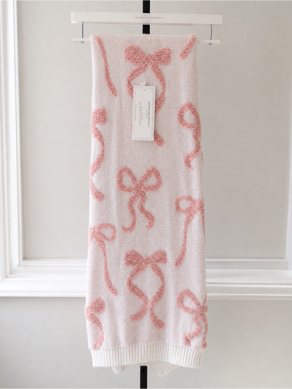 cupcakes & cashmere Pink Bow Motif Decorative Throw